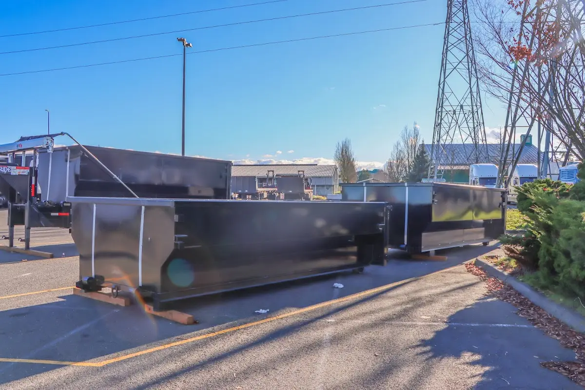 Roll-off dumpster ready for waste disposal at job site for 15 Yard Dumpster Rental in Bee Cave